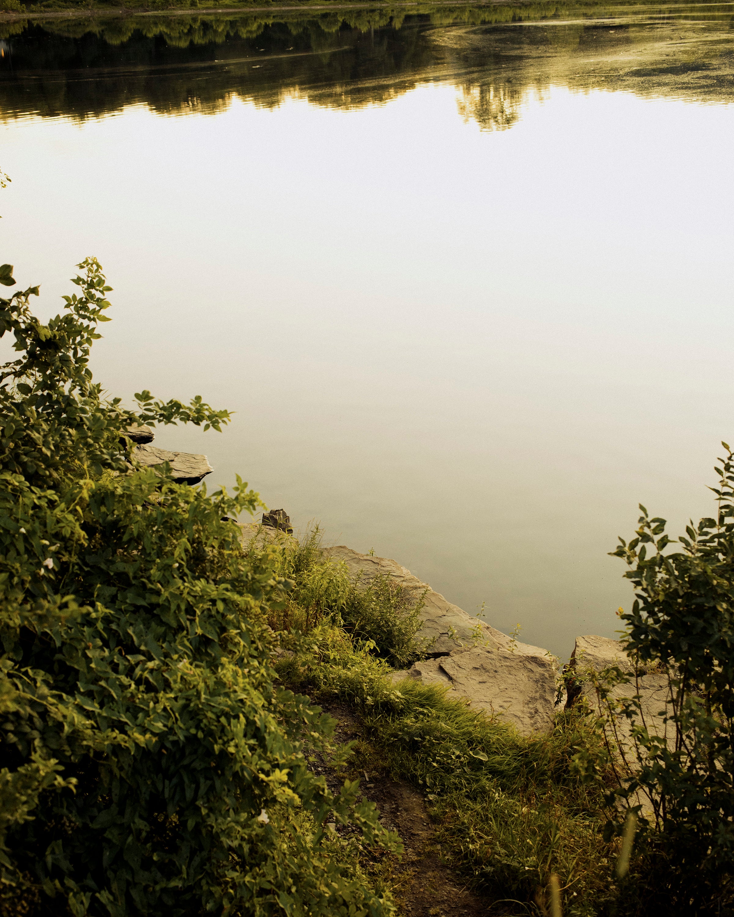 Landscape image of the Delaware River at sunset