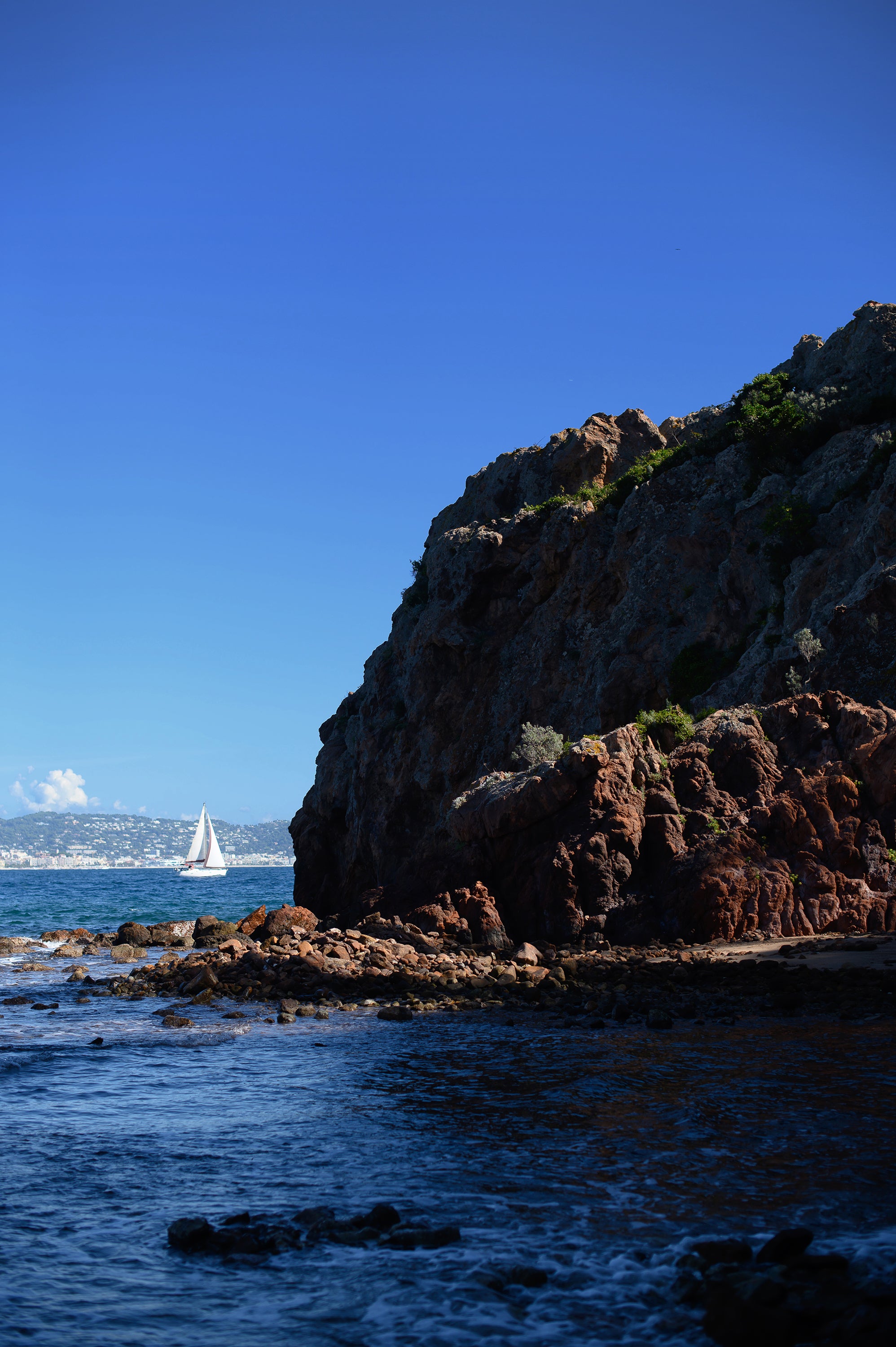 landscape image of azure colored cove on the mediterranean
